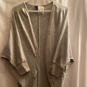 1/2 arm soft cardigan brand new with tag polyester and spandex size small